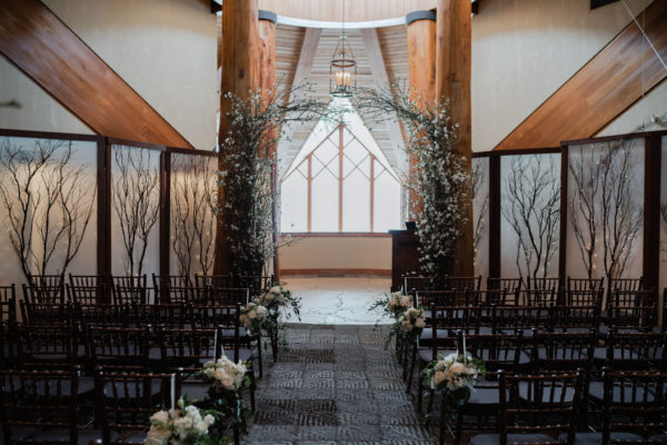 Ceremony arch with cherry blossoms