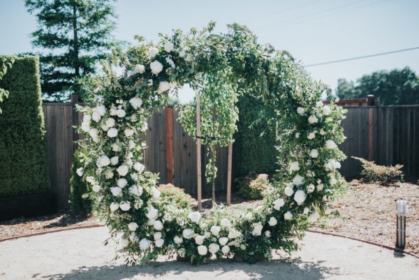 Circle wedding arch with flowers